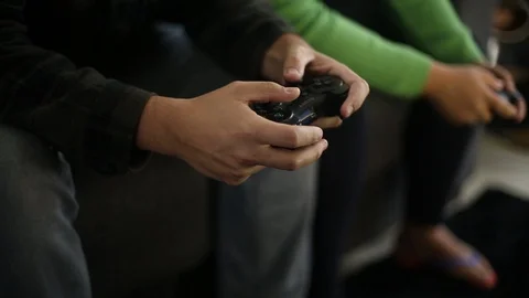Fingers playing Joystick Vídeo Stock 128699747