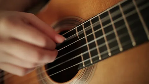 Fingers Plucking Classical Guitar Strings, Cinematic Musical Detail Stock Footage 346600236