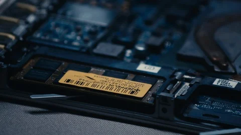 Fingers remove memory card from open laptop notebook computer. Extreme Stock Footage 115484171