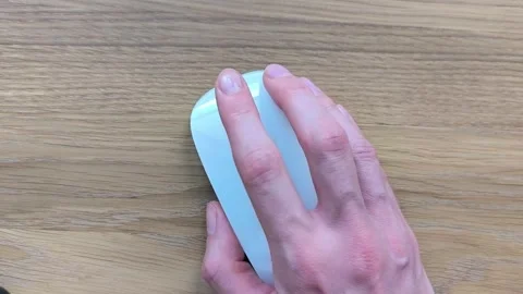 Fingers scrolling a mouse wheel back and forth. Hand rotating the scroll co.. Stock Footage 340283731
