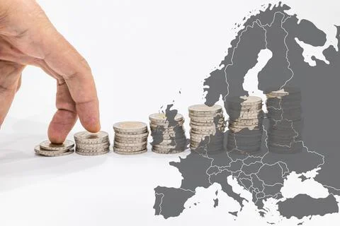 Fingers step on a stack of coins and Europe map. The concept of the energy Stock Illustration