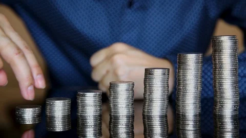 Fingers striding on the coins. Stock Footage 129175341