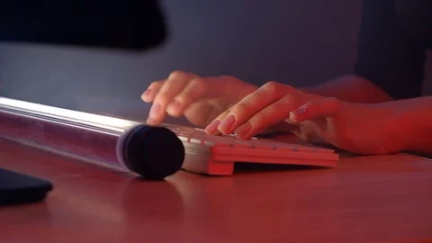 Fingers taping on keyboard pc. Hacker girl works at the computer. Video stock 90073575