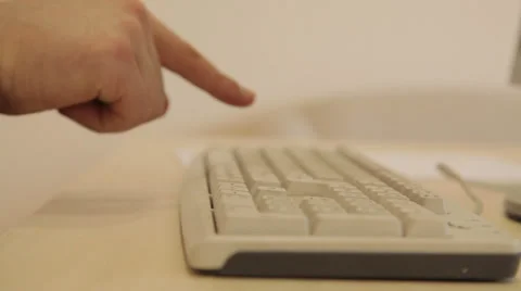 Fingers tapping on a computer keyboard Vídeo Stock 36176050