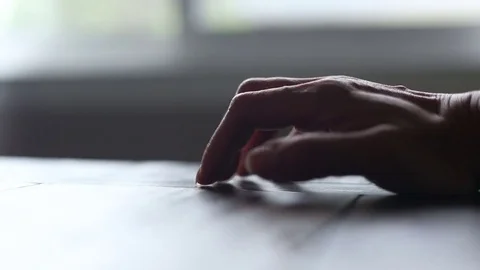 Fingers tapping on table, video Stock Footage 78450993