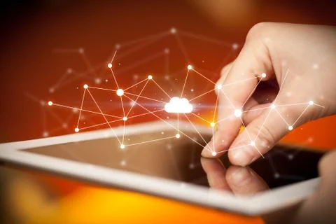 Fingers touching tablet with cloud concept Stockfoto's