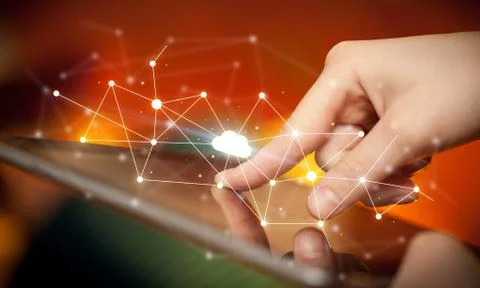 Fingers touching tablet with cloud concept Foto stock