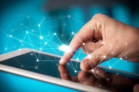 Fingers touching tablet with cloud concept Foto stock