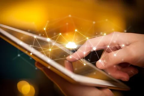 Fingers touching tablet with cloud concept Foto stock