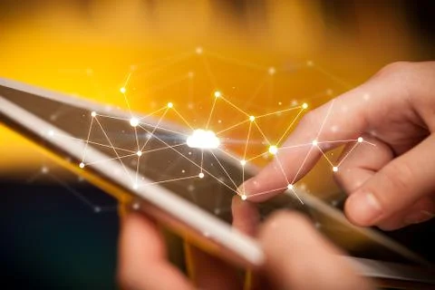 Fingers touching tablet with cloud concept Foto stock