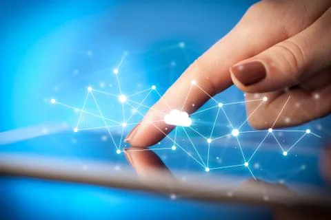 Fingers touching tablet with cloud concept Stockfoto's