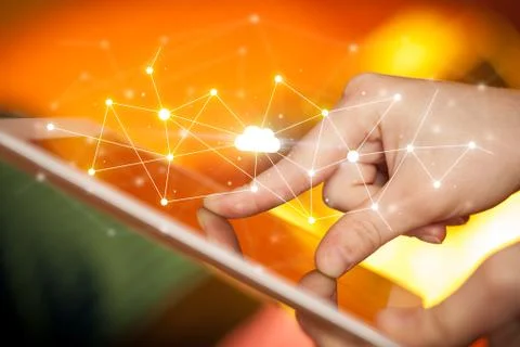 Fingers touching tablet with cloud concept Foto stock