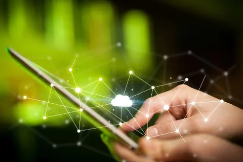 Fingers touching tablet with cloud concept Foto stock