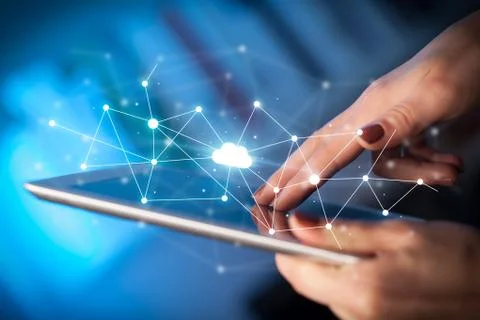 Fingers touching tablet with cloud concept Foto stock