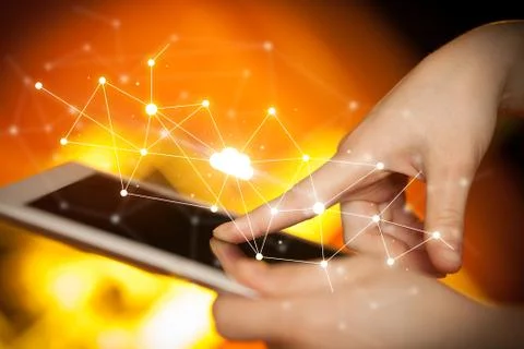 Fingers touching tablet with cloud concept Foto stock