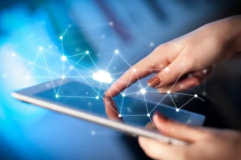 Fingers touching tablet with cloud concept Foto stock