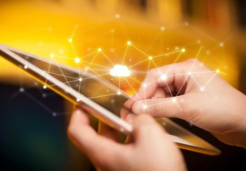 Fingers touching tablet with cloud concept Stockfoto's