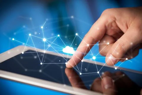 Fingers touching tablet with cloud concept Stockfoto's