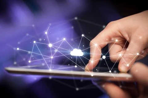 Fingers touching tablet with cloud concept Foto stock