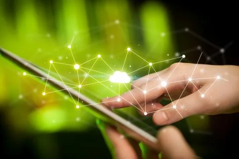 Fingers touching tablet with cloud concept Stockfoto's