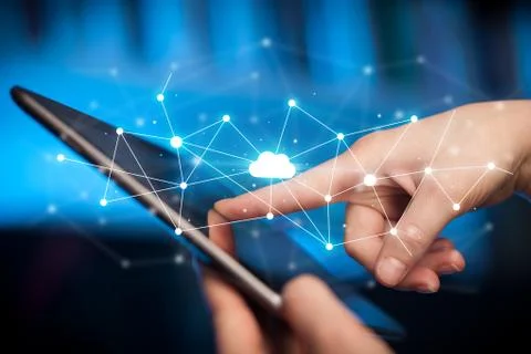 Fingers touching tablet with cloud concept Foto stock