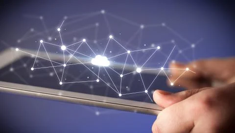 Fingers touching tablet with cloud concept Stock Photos