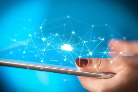 Fingers touching tablet with cloud concept Foto stock