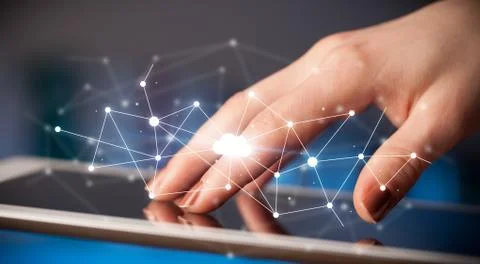 Fingers touching tablet with cloud concept Foto stock