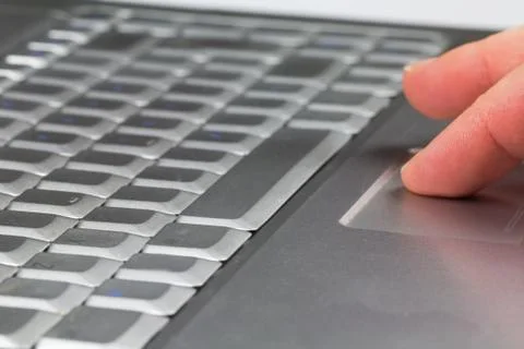 Fingers on a touchpad Stock Photos