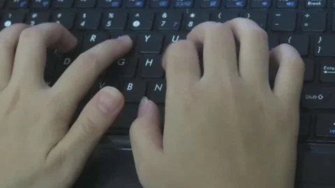 Fingers typing on computer Stock Footage 70375476