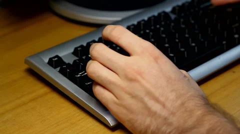 Fingers Typing At Desktop Computer Keyboard Video stock 41781215