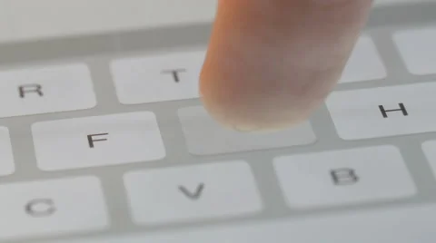 Fingers typing on a digital keyboard Stock Footage 58498537