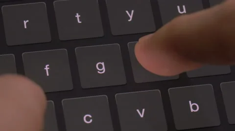 Fingers typing on a digital keyboard Stock Footage 58498544