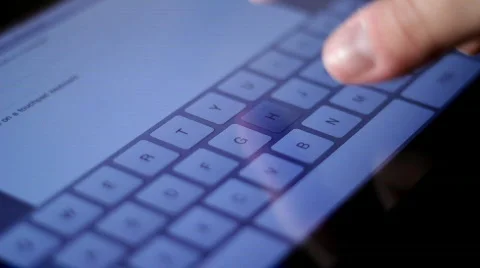 Fingers Typing on an iPad Closeup Stock Footage 685872