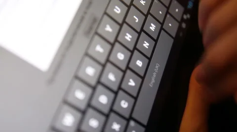 Fingers typing on the tablet; close-up Stock Footage 58809202