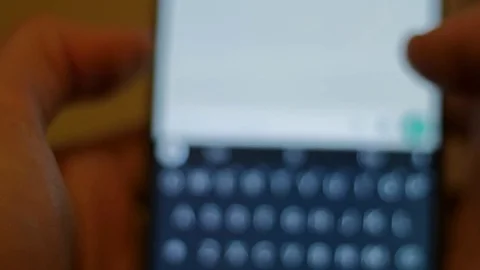 Fingers typing on a touchscreen Stock Footage 84305475