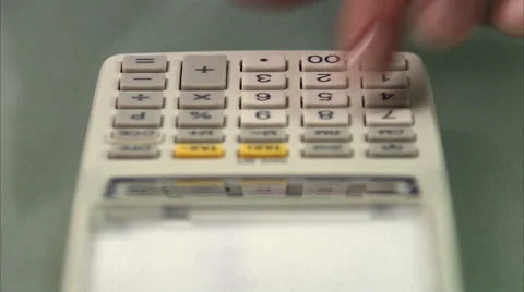 Fingers using a calculator, Sweden. Video stock 51818371