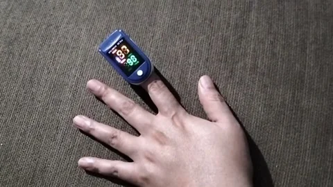 Fingertip Pulse Oximeter Reading Stock Footage 293787161