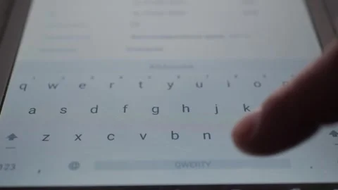 Fingertip touching touchscreen keyboard Stock Footage 342863594