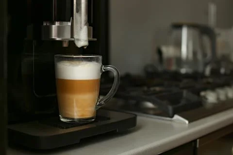 The finished coffee has three layers of white, beige and brown. Layering. Coffee Stock Photos