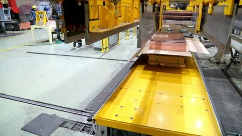 Finished copper sheets out of the machine on the cart Stock Footage 103847909