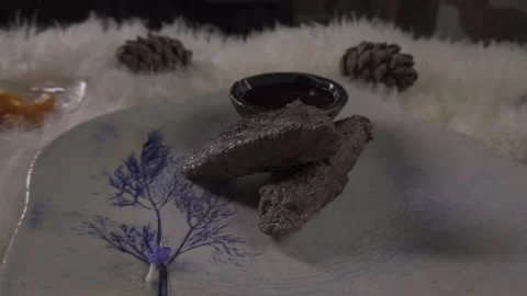 The finished dish, meat, slow motion, sprinkled with flowers Stock Footage 322011831