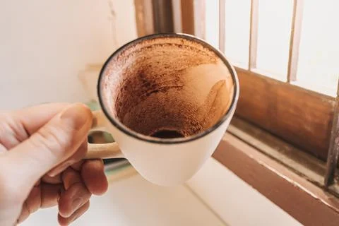 Finished empty hot cocoa in a mug served in a cafe. Stock-Fotos