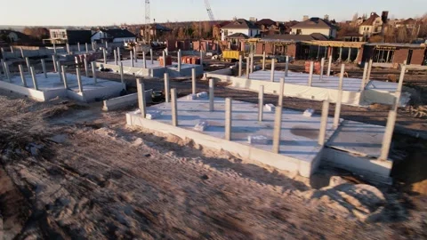 Finished frame foundation of the cottage town drone view Video stock 174810318