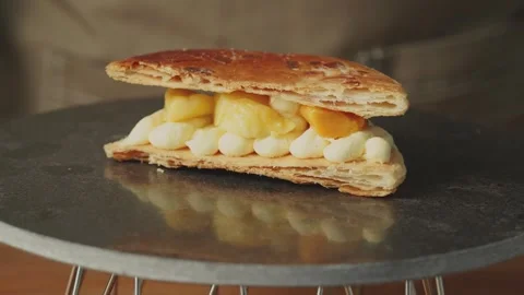Finished Fruit Cream Pie Spinning on Rotating Turntable Stock Footage 335343847