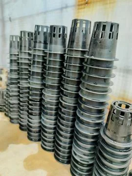 The finished netpot stack is cleaned and left to dry. Netpots are used as c.. Stock Photos