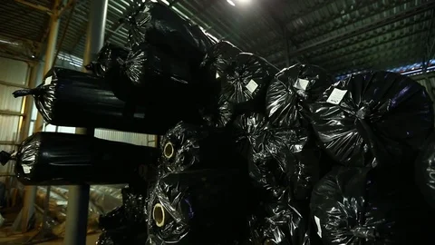 Finished product storage pipe rolls dark Stock Footage 71669276
