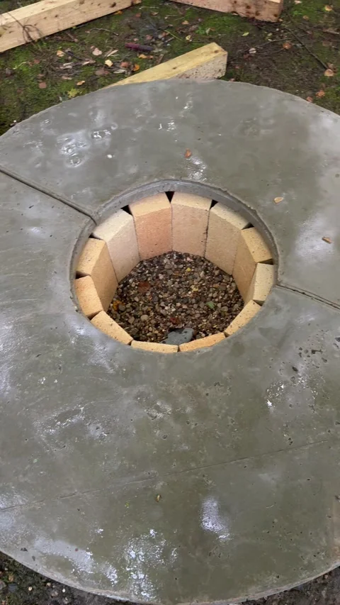 Finished Round Concrete Tabletop for DIY Garden Fire Pit Stock Footage 342002137