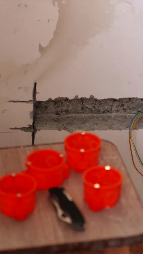 Finished wall conduit with socket box and electrical cable vertical Stock Footage 339298255