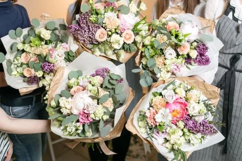 The finished work. Master class on making bouquets. Summer bouquet. Learning Stock Photos